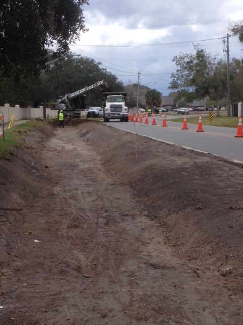 Ditch maintenance performed along street