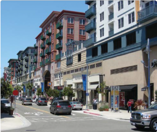 Street Lined with Business and Apartments