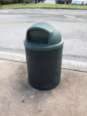 Close photo of an outdoor trashcan.