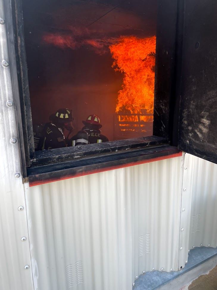 Firefighters training in Live burn building