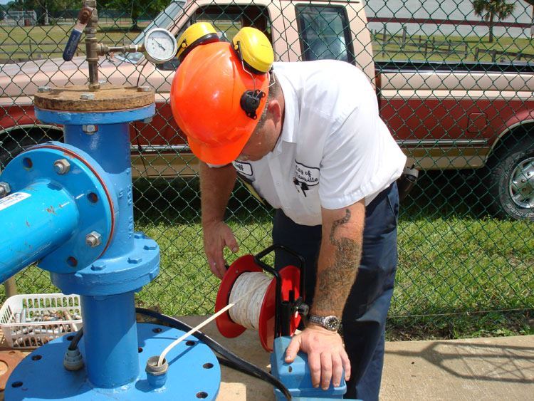 Man Fixing water pipe